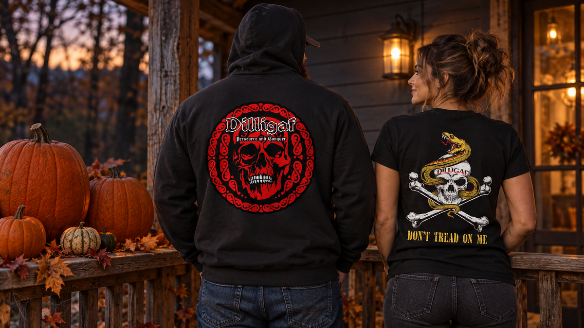 Woman wearing yellow snake skull shirt and man wearing red skull hoodie on a porch with whole pumpkins — horizontal